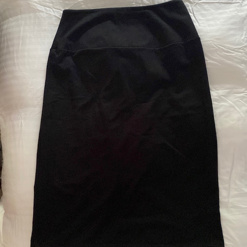 Pencil skirts, 2 for 1 price. Tummy smoother. Medium “Women w/Control”. NWOT